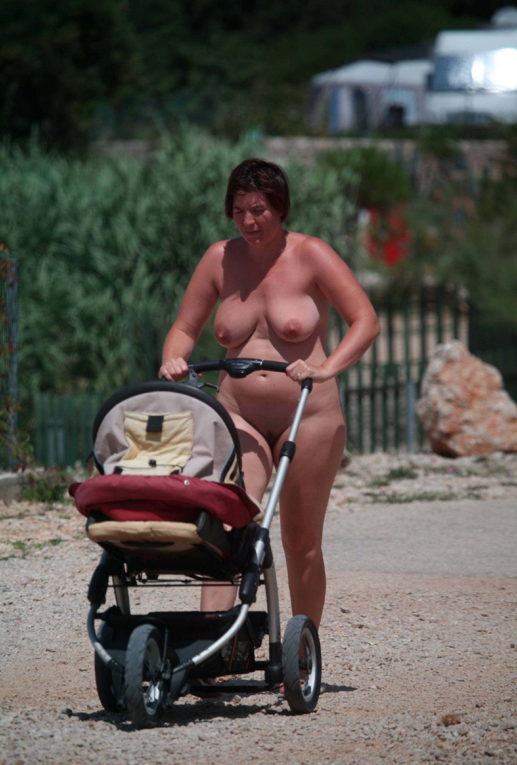 Embracing Freedom and Nature: A Black-Haired Naturist’s Clothing-Free Adventure in the Park - 2